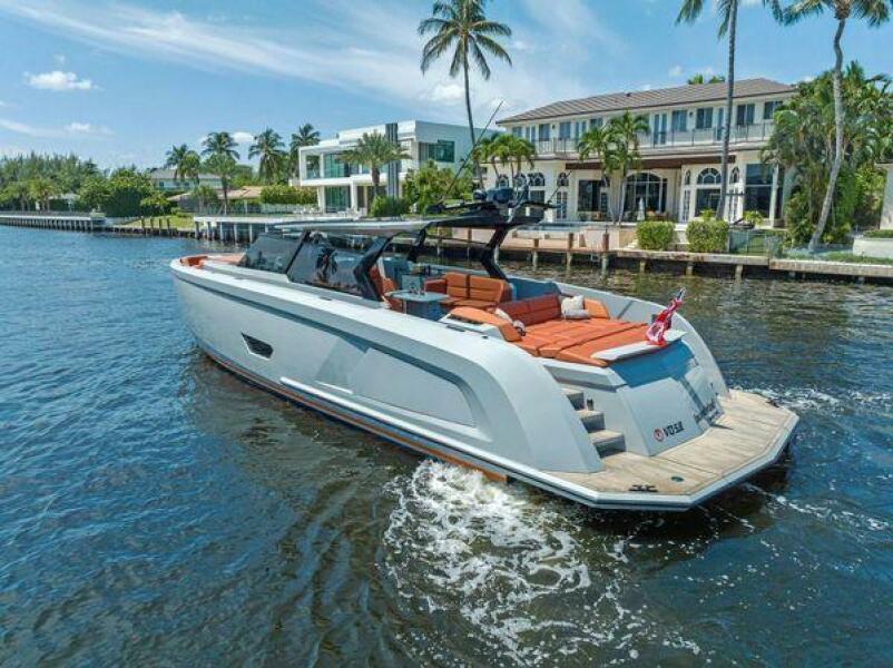 Luxury yacht cruising at sunset